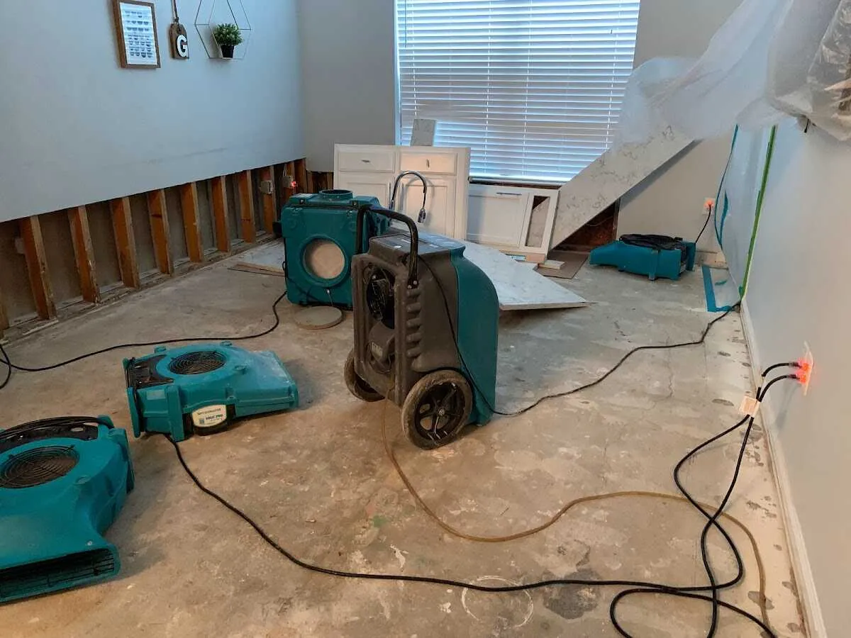 Dehumidifier in flood-cut room for Water Damage Restoration in Shelby